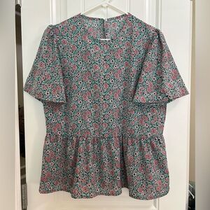Floral peplum blouse M
